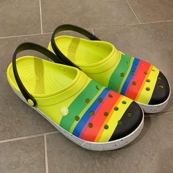 white crocs with rainbow bottom